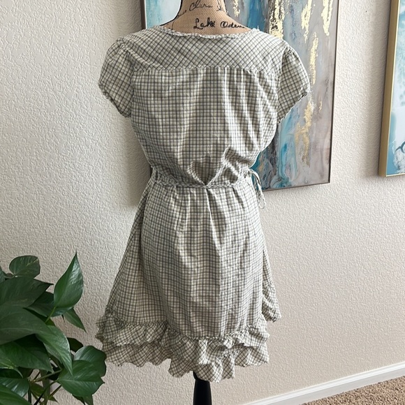 Converse Women's Green and Khaki Dress
Excellent conditions
Size L.
#54A - Picture 5 of 7